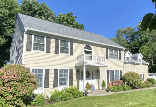 Roof replacement and new gutters on a Colonial-style home in Norwalk, CT