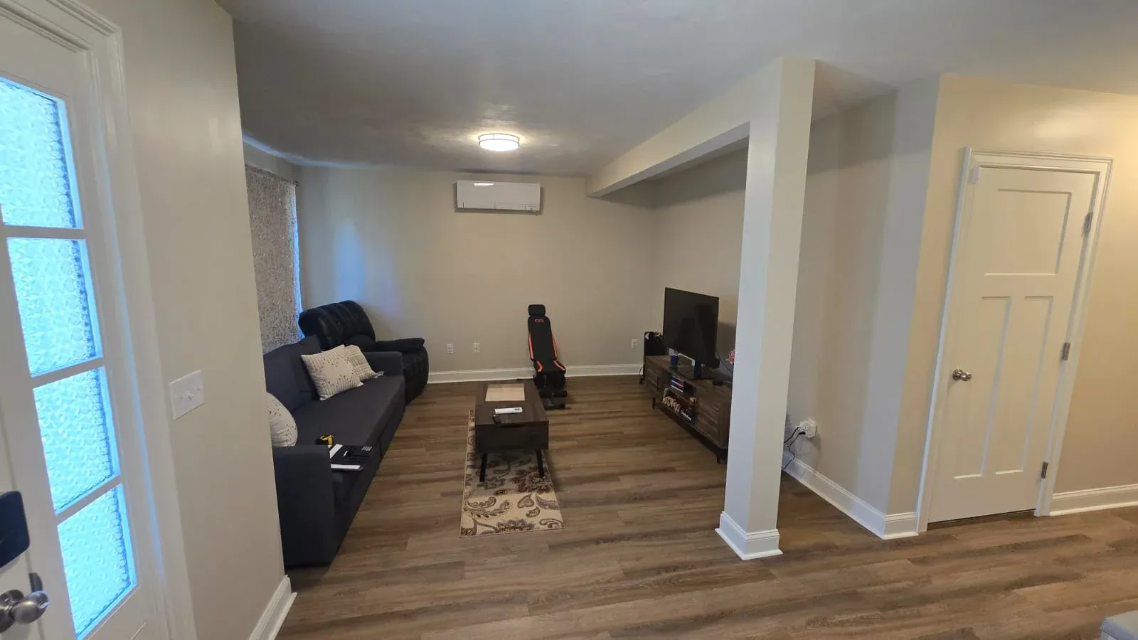Open area before guest bedroom conversion in Wilmington Massachusetts