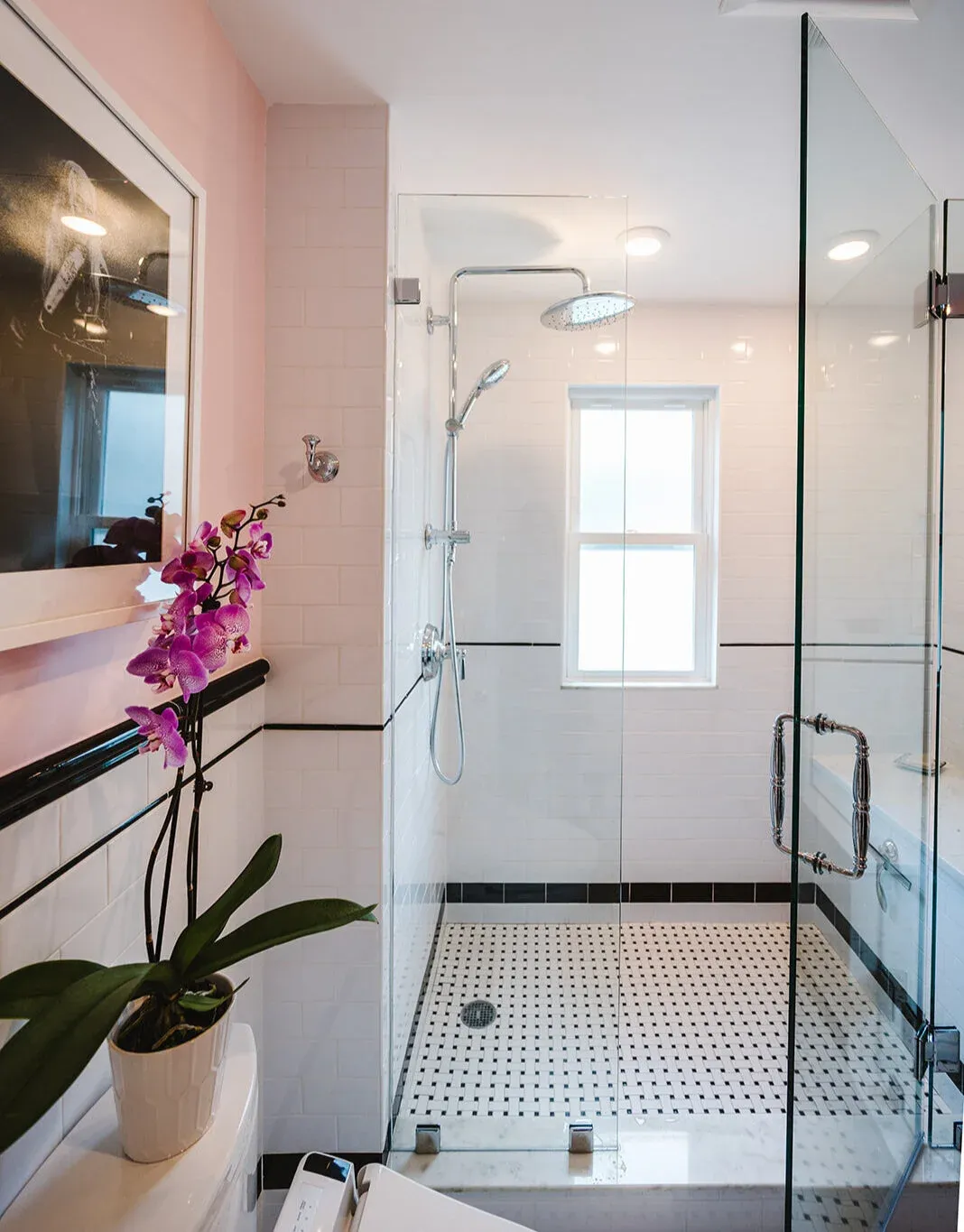 Dorchester, MA -- “Deco Primary Bath and Attic Guest Bath” Design Services and Construction. A dated primary bath was re-imagined to reflect the homeowners love for their period home. The addition of an attic bath turned a dark storage space into charming guest quarters. A stunning transformation.
