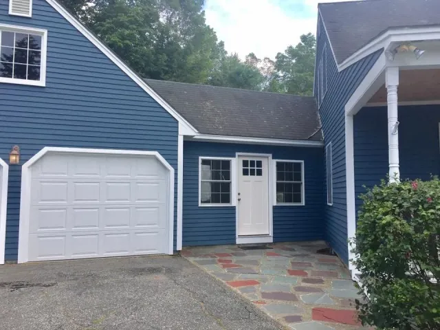 Exterior painting on siding and trim in Lebanon, NH