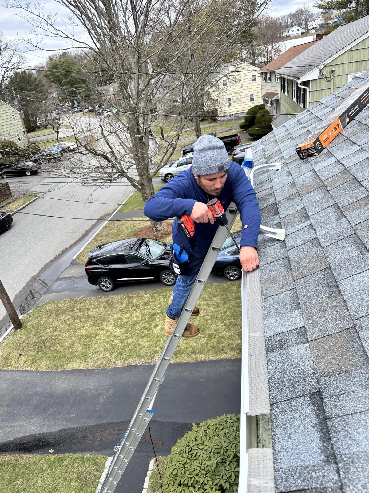 Windows Cleaning Expert professional installing gutter guards