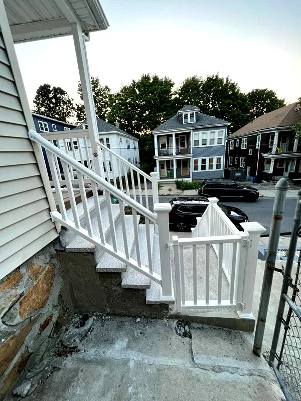 Granite entry stairs with new vinyl rail and gate