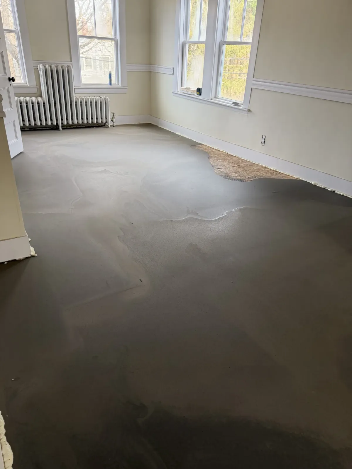 Self-leveling floor correction during whole-house reconstruction in Wayland Massachusetts