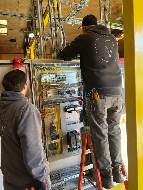KEC team working on 480V controls cabinet