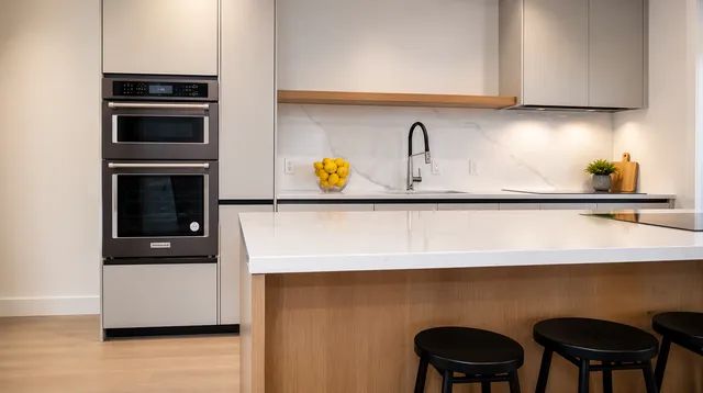 Modern kitchen remodeling project completed by Ocazo Construction in Cape Cod, Massachusetts featuring custom cabinetry, quartz countertops, and premium finishes.