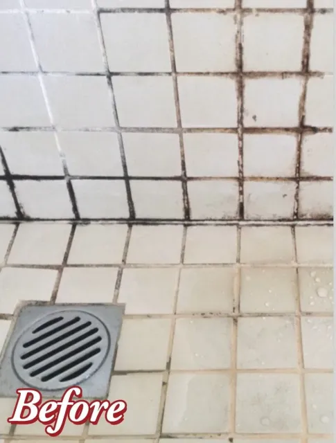Accessible shower with built-in bench, grab bar, multiple shower heads, and tiled walls/floor.