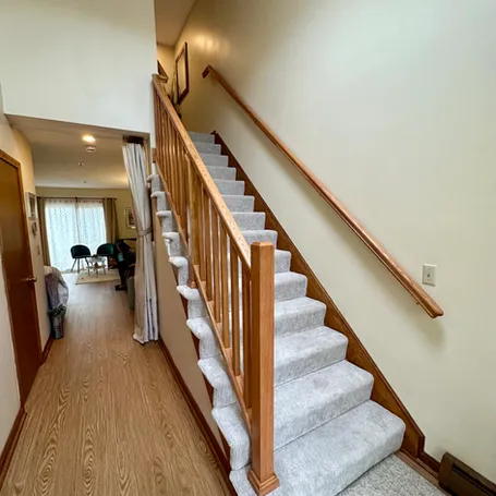 Custom red oak stair railing rebuild with new posts and balusters

Solid red oak staircase railing providing improved safety and stability

Close-up of finished oak balusters and handrail detail

Interior stair railing remodel using custom hardwood carpentry
