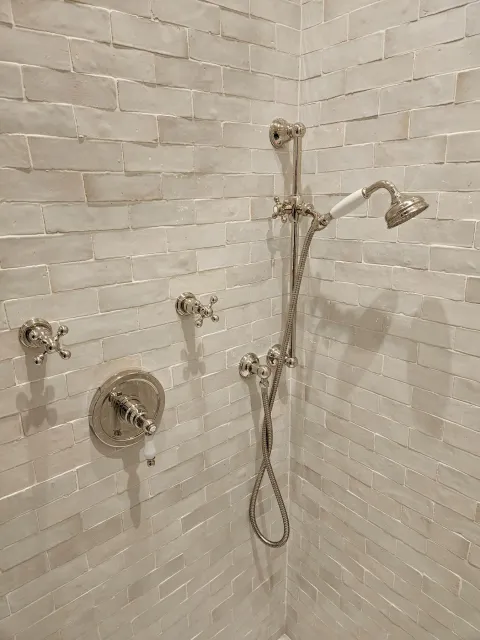 Finished specialty shower fixture installation