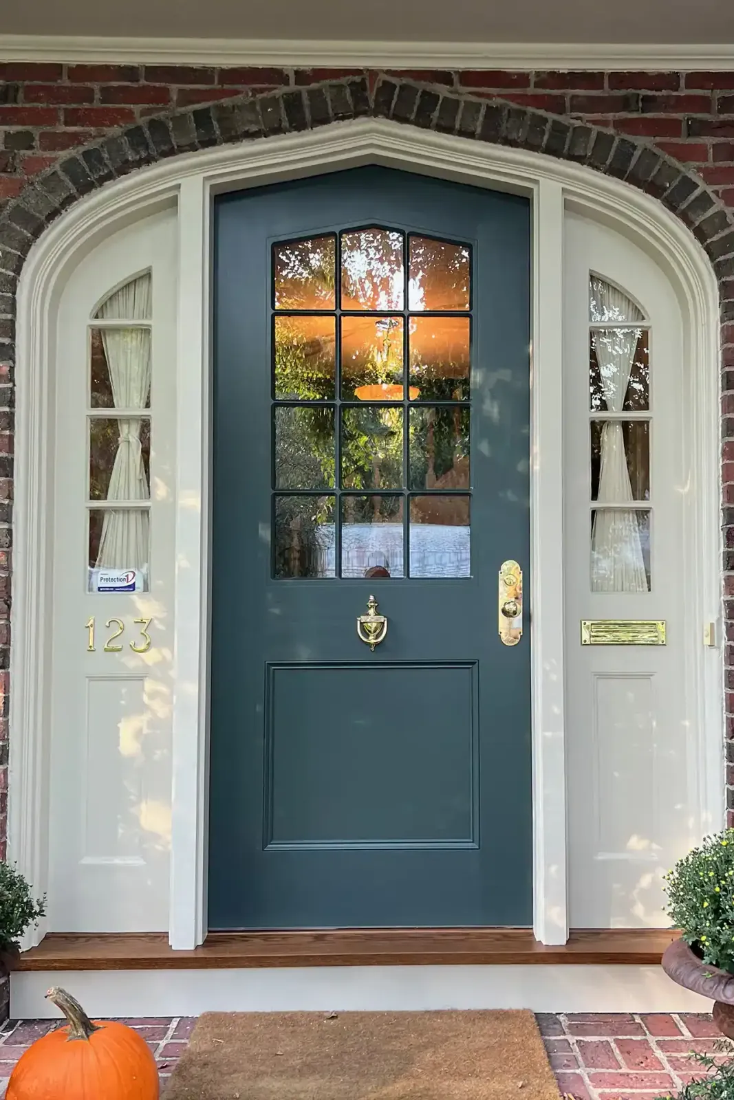 Door Replacement In Boston for this beautiful hand crafted entry way featuring side lights.
