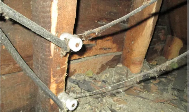 Original knob and tube wiring in an attic
