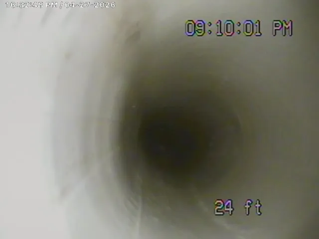 24 ft downstream: clear, open pipe all the way to the city main. Every root removal job ends with a verification camera run — no guessing.
