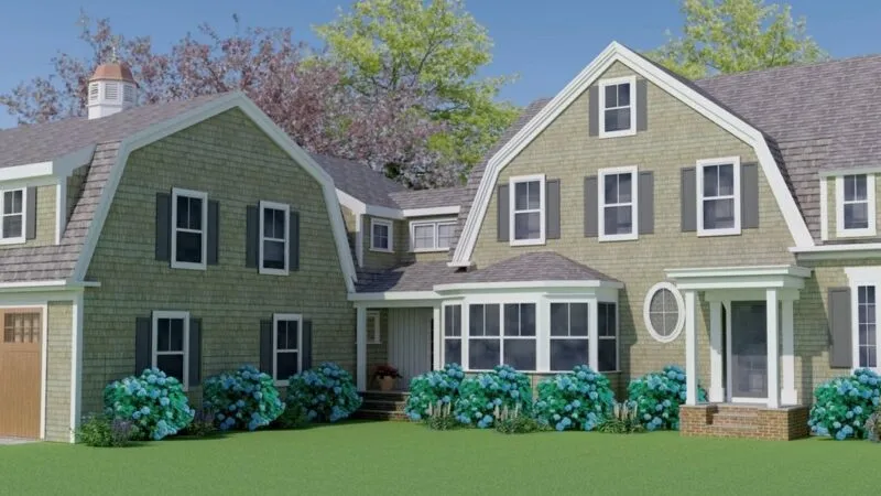Two-story tan house with white trim, black shutters, gabled roofs, blue hydrangeas – McPhee Associates of Cape Cod.