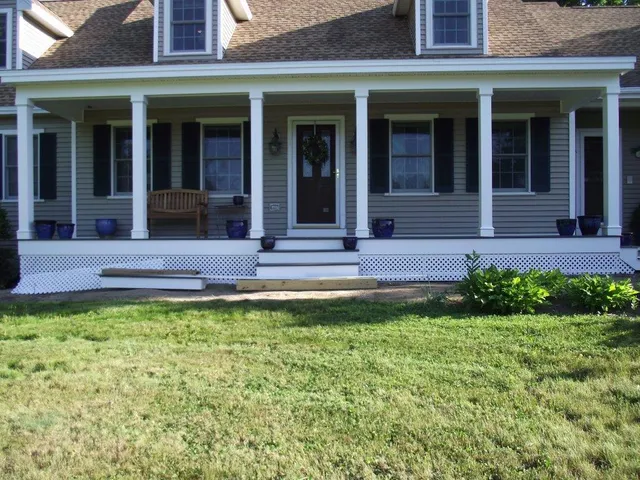 Exterior shot of home showing new front porch