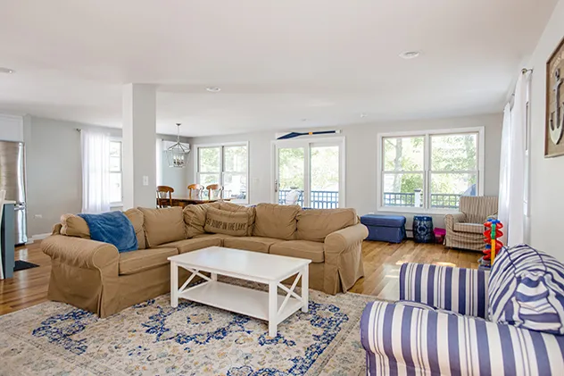Custom trim carpentry in an open-concept living room by 1731 Woodworks