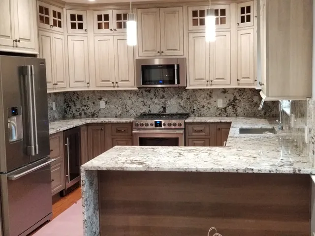 Renovated kitchen with pendant lighting and appliance wiring