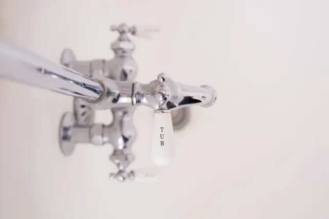 Vintage bathtub faucet with TUB label