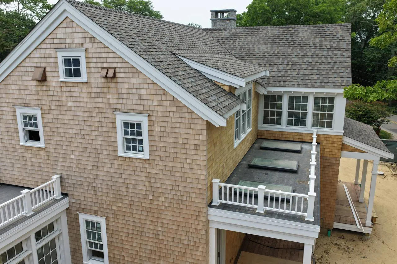 Roof valley with red copper flashing detail