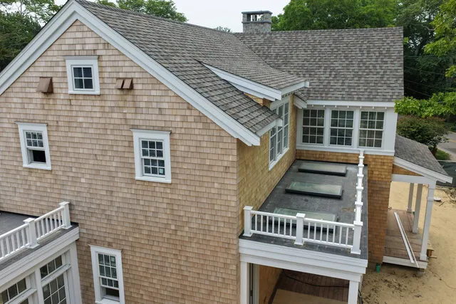 Roof valley with red copper flashing detail