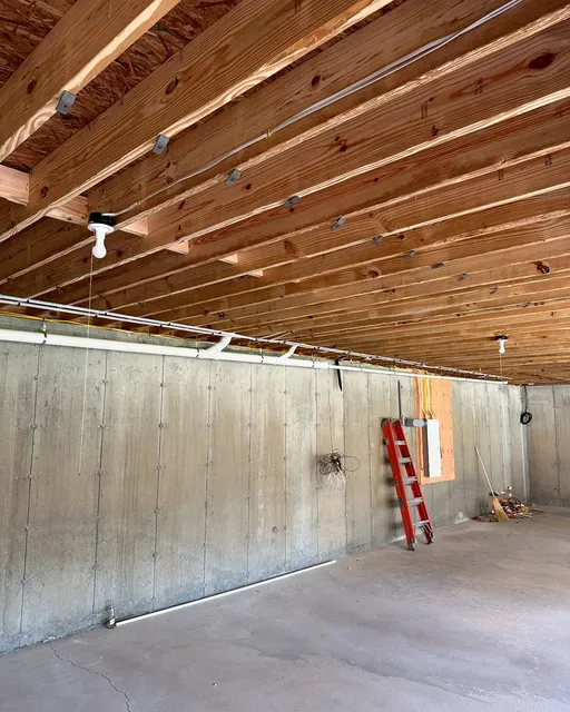 New construction plumbing rough-in with exposed framing and piping by Top Tier Plumbing & Heating LLC
