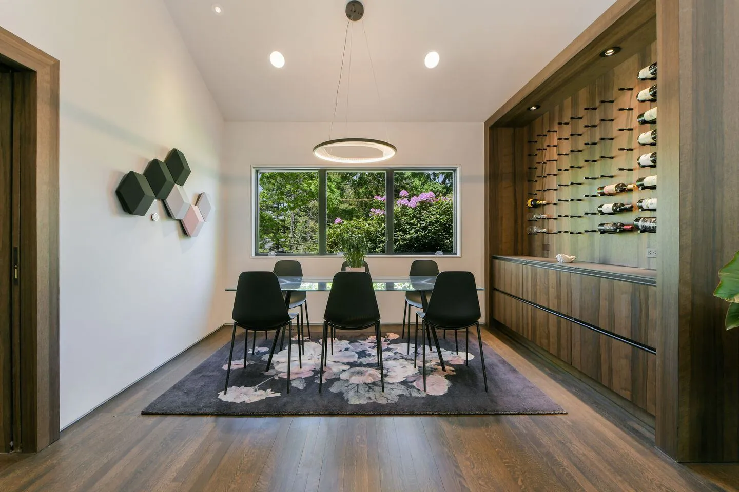 Dining room with custom wine display wall