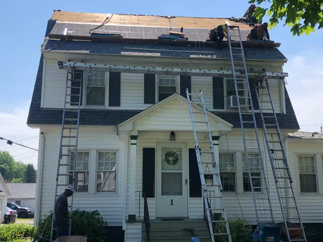 work photo from newroofingandsiding.com