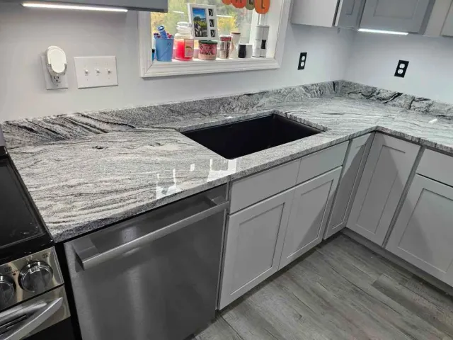 Granite countertop with undermount sink cutout — seam and sink planning by Precision Granite Works in Farmington, NH