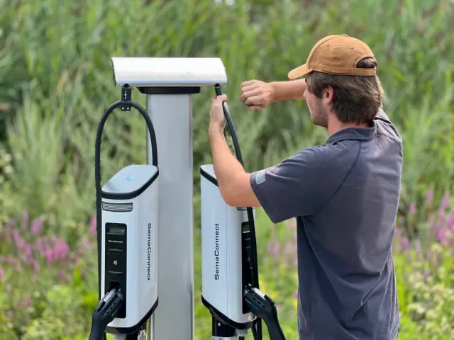 Our electric vehicle charging solutions service offers homeowners a convenient and efficient way to charge their EVs at home, providing ease of use and promoting sustainability in transportation. for Daniels Electric in Groveland, MA