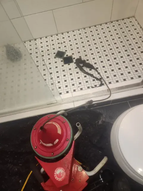 Clogged bathtub drain with debris removed during plumbing service in Norwalk CT