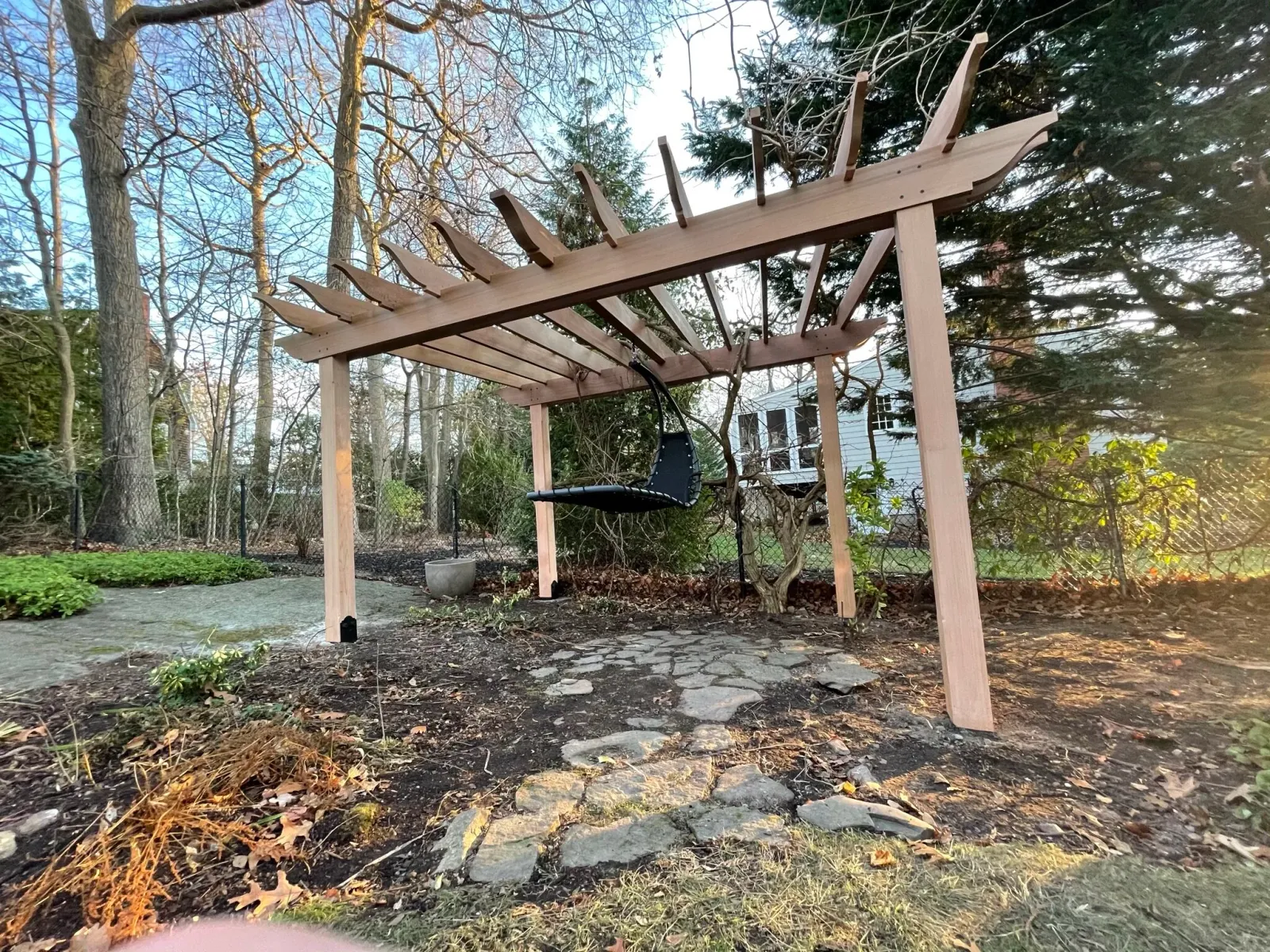 Western red cedar pergola with swinging seat