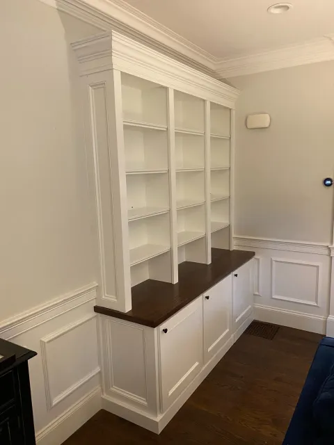 Cabinets and shelving tucked into an unused corner of the client’s living room.
