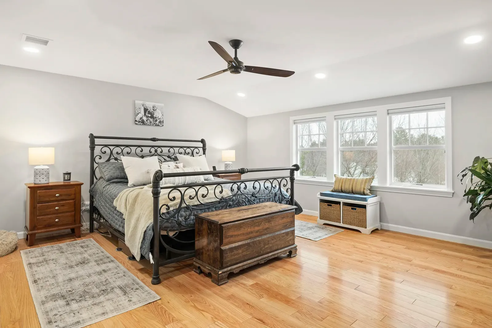 Township primary suite addition in Southern New Hampshire — attic above the garage converted into a bedroom suite by Oak Hill Design & Build