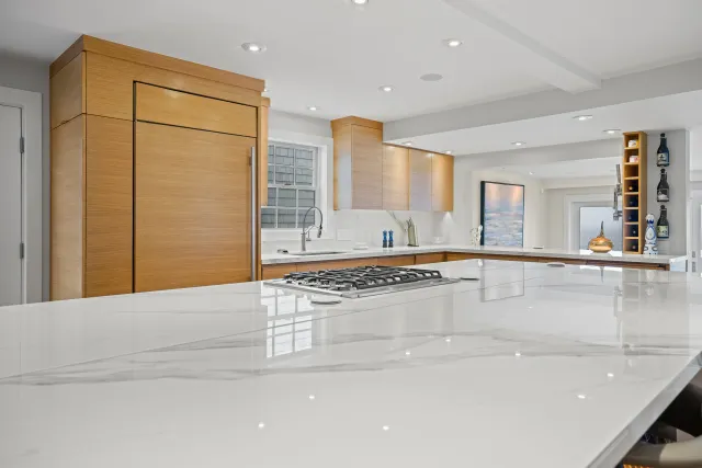 Modern kitchen with polished quartz countertops