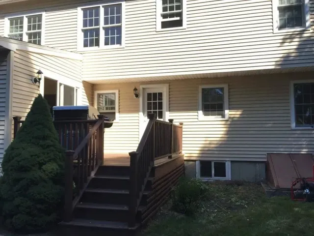 Rear elevation before deck and addition work