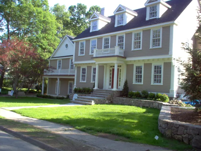 Colonial yellow home exterior
