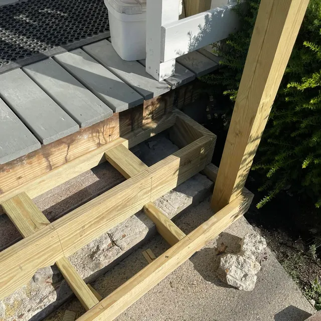 New pressure-treated stair stringers and treads