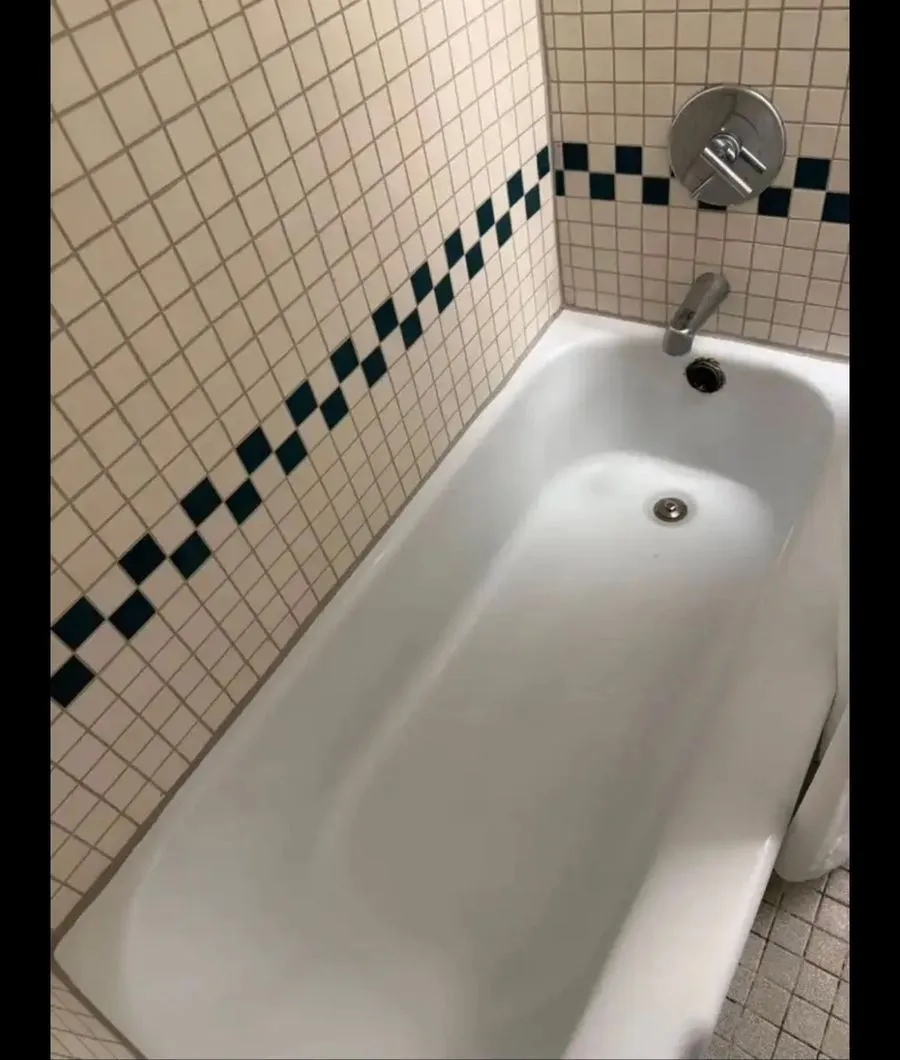 Clean white bathtub after restoration cleaning