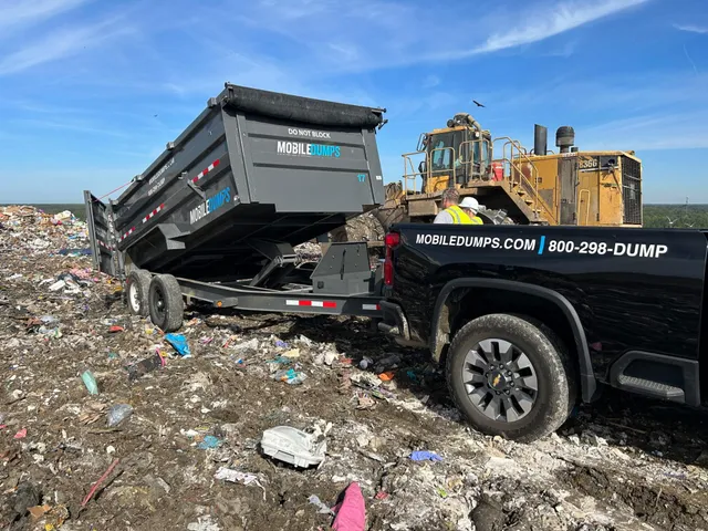 Mobiledumps Dumpster being dumped at landfill