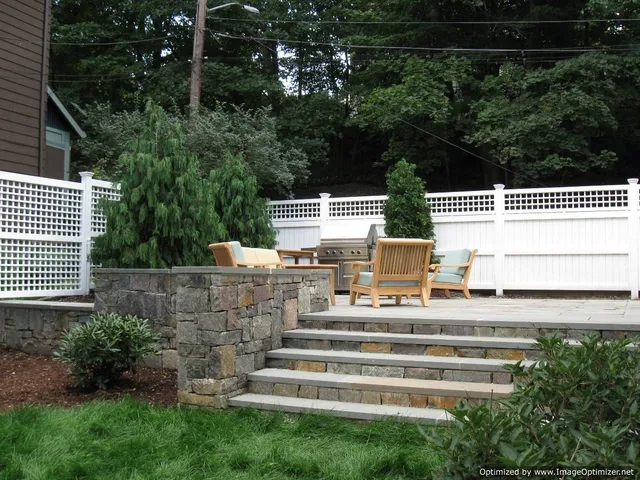 Stone walkway project by Corliss Landscaping, highlighting expert hardscape design.