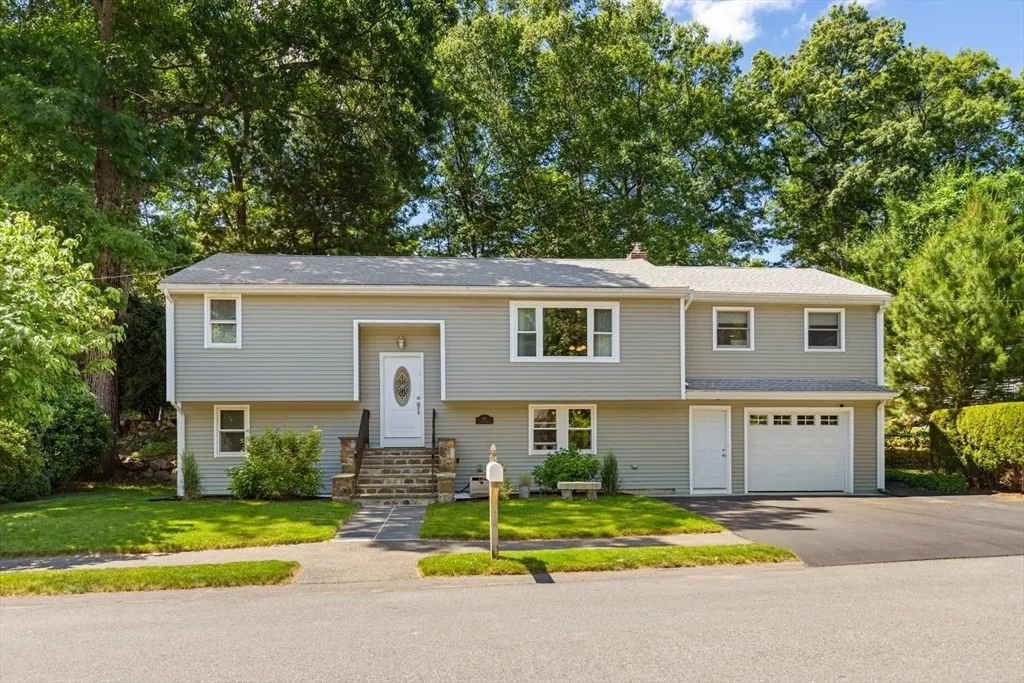 Well-maintained split-entry home located in one of Lynn’s most desirable Ward 1 neighborhoods, just moments from Lynn Woods Reservation. This move-in ready property offers 4 bedrooms, 2 full bathrooms, 8 total rooms with a flexible and functional layout. The main level features a bright kitchen with stainless steel appliances, ample counter space, and an adjoining dining area that flows into a comfortable living room. A screened-in porch off the kitchen/dining area provides the perfect space for relaxing or entertaining while overlooking the backyard. Two well-sized bedrooms and a full bath complete the upper level. The lower level provides two additional bedrooms, a spacious family room, and direct access to the garage. Enjoy outdoor living in the beautifully manicured, fully fenced backyard, perfect for entertaining or relaxing. The home also offers strong curb appeal and convenient access to major highways, Route 1, as well as nearby restaurants, shopping, and everyday amenities.