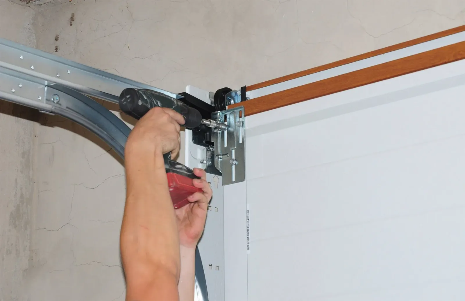 Repairman Repair Garage Door Opener — Lowell, MA — Lowell Overhead Doors
