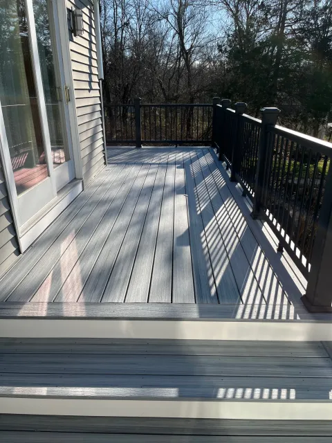 residential-decking-with-black-metal-railing-in-needham-ma