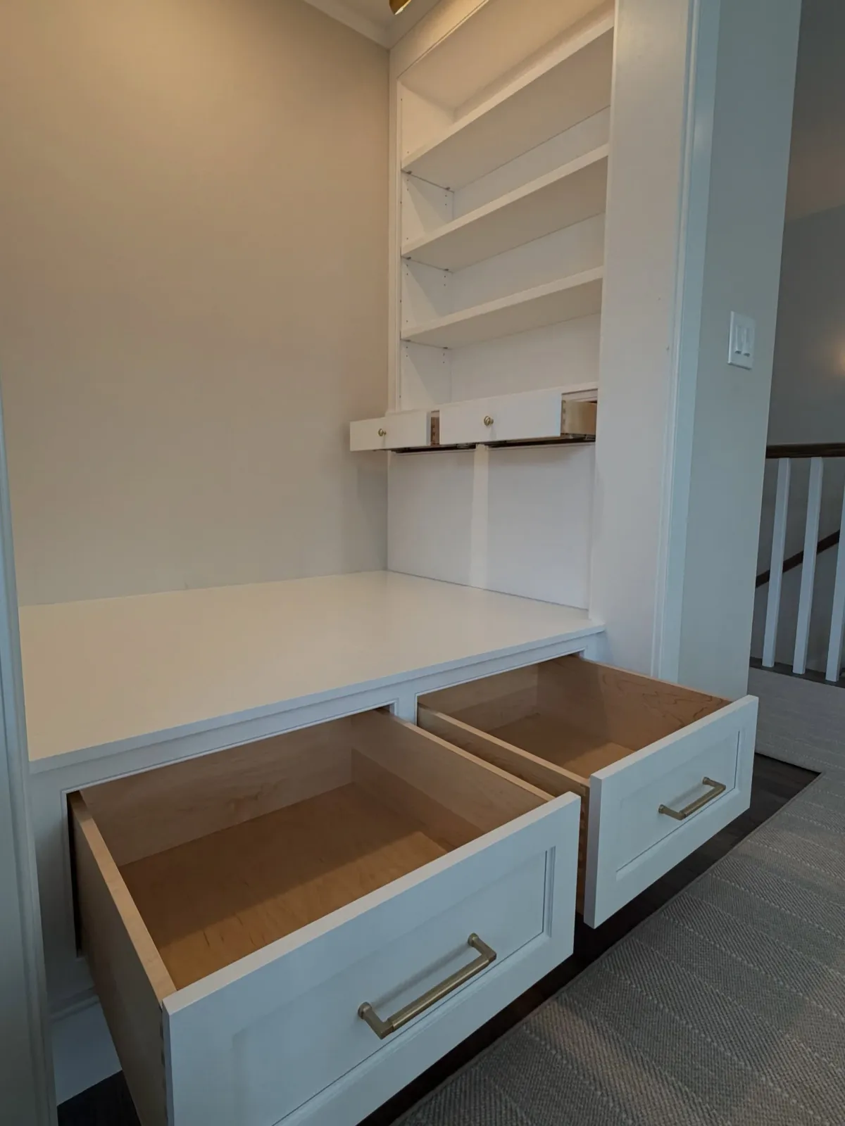 A cozy corner made custom for slow mornings, quiet moments, and getting lost in a good book ✨📚🤍 #ReadingNook #CustomBuiltIns #HomeDesign #CozyCorner #DaybedDesign  In collaboration with @uniquestairways_carpentry