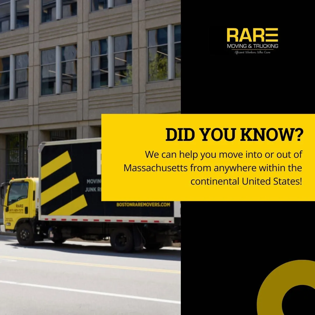 RARE Moving & Trucking branded box truck on a city job