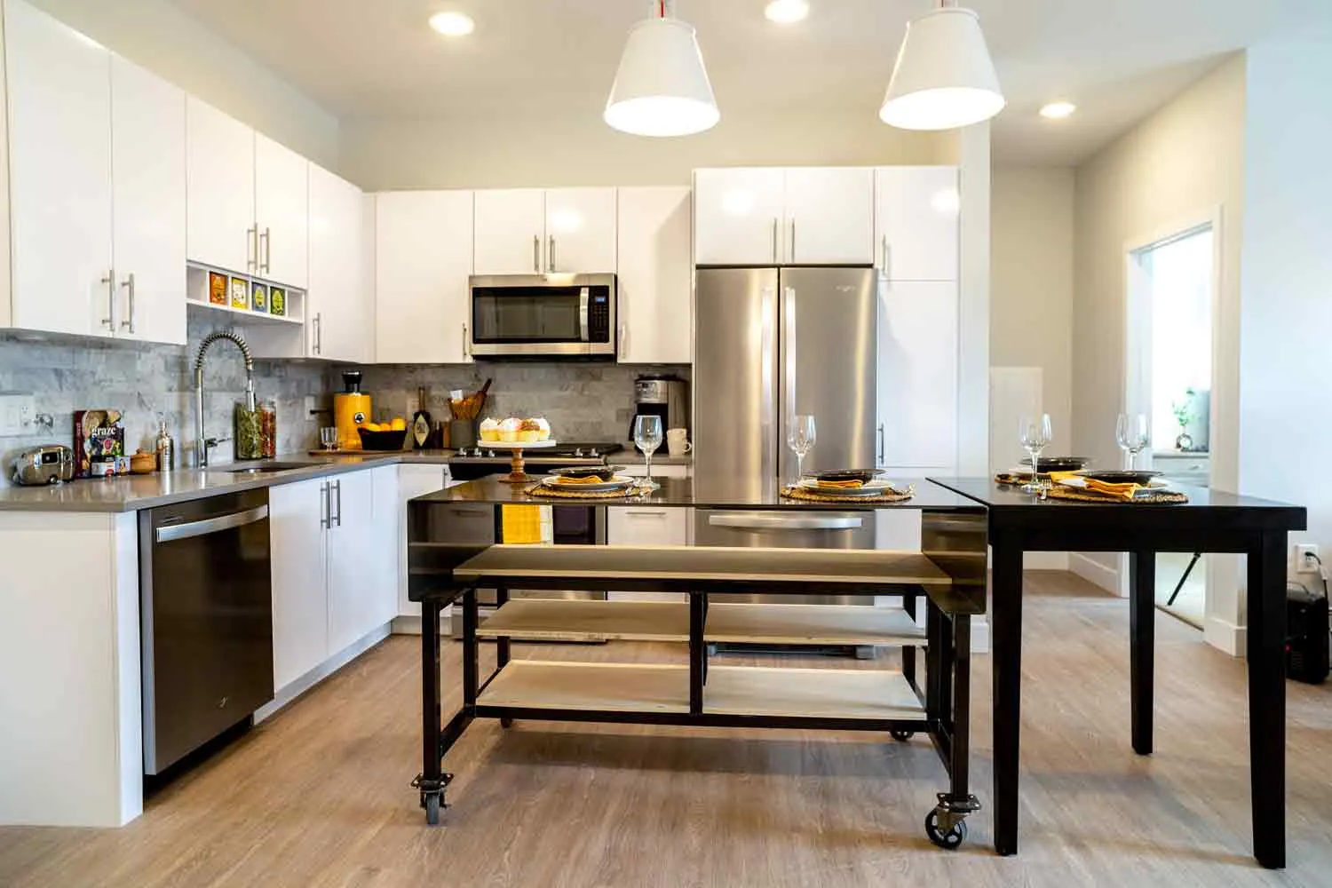 Kitchen with custom rolling island on casters