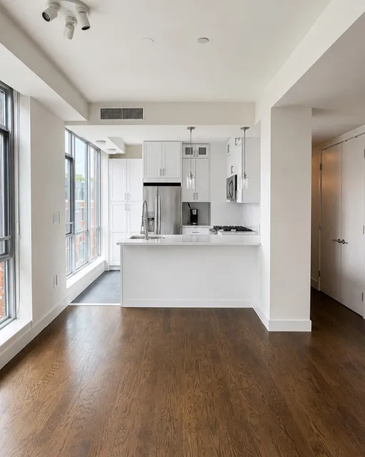 Open-Concept Kitchen Renovation with Peninsula Seating | Boston, MA