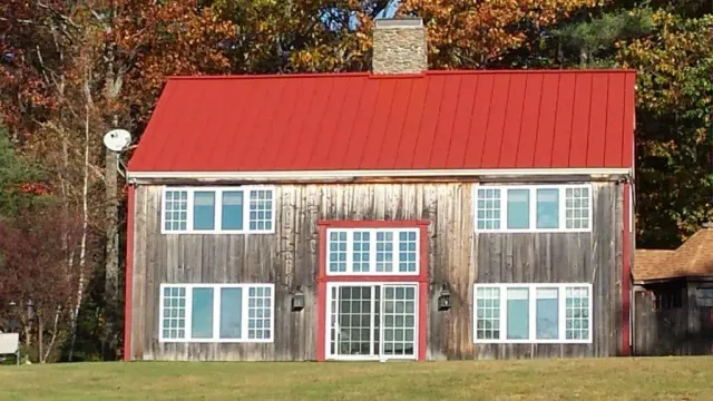 After - Red Standing Seam Metal Roofing