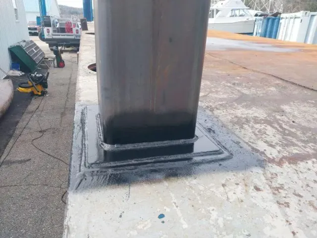 Steel base weld repair performed on-site by Warrior Welding, specializing in mobile aluminum and industrial welding solutions