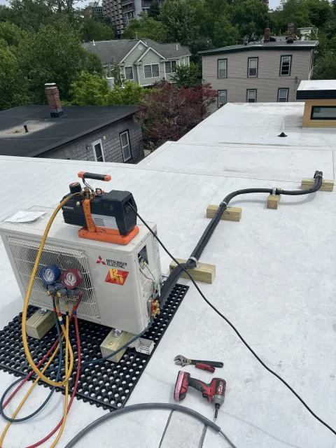 Rooftop condenser going through commissioning by TJM Climate Control, Southern NH & northern MA