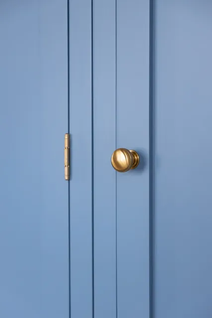 Painted blue interior door detail
