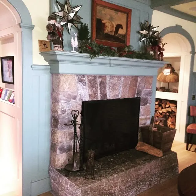 Came across this in the camera roll from many years back, a fieldstone fireplace with firebrick laid in a unique Flemish bond pattern and a one piece salvaged granite hearth.